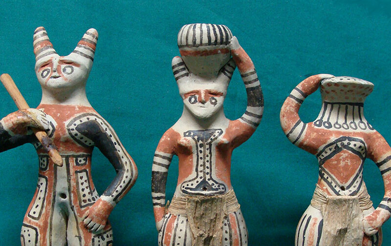 three clay figures